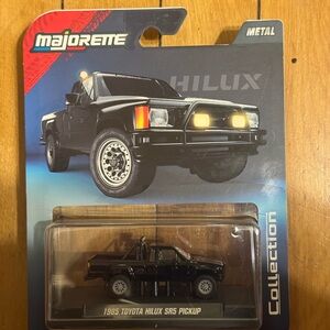 NIB Majorette 1985 Toyota Hilux SR5 Pickup Black 1:64 Collector Series – Diecast